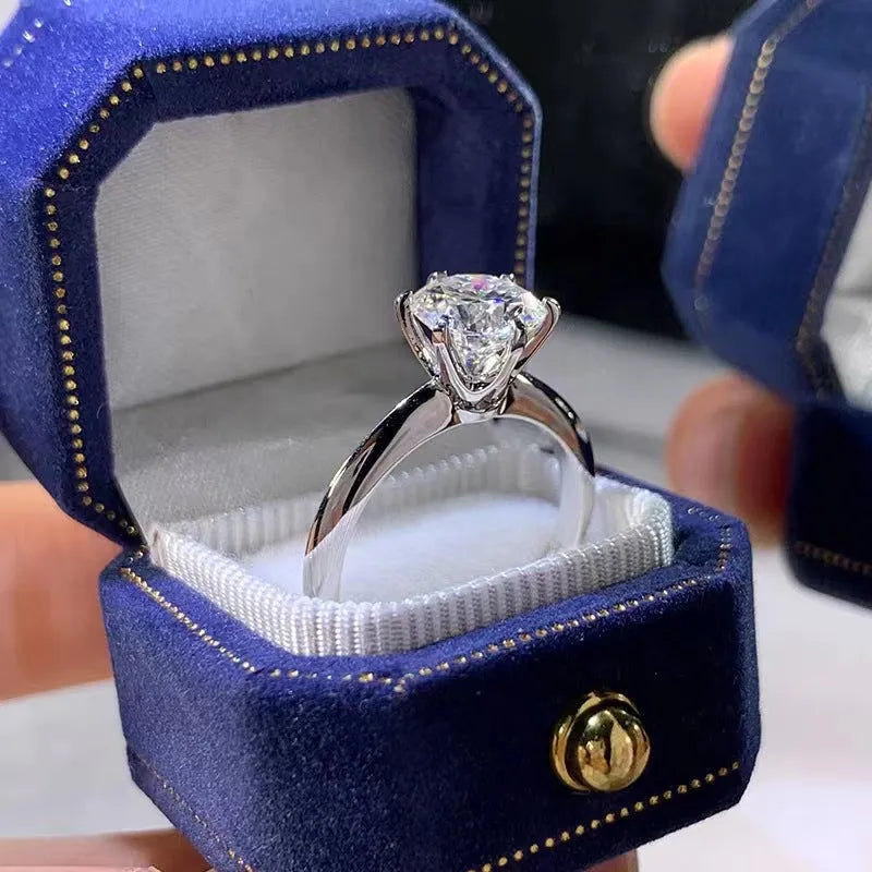 Six-claw inlaid zircon women's ring with geometric design in white gold plated finish
