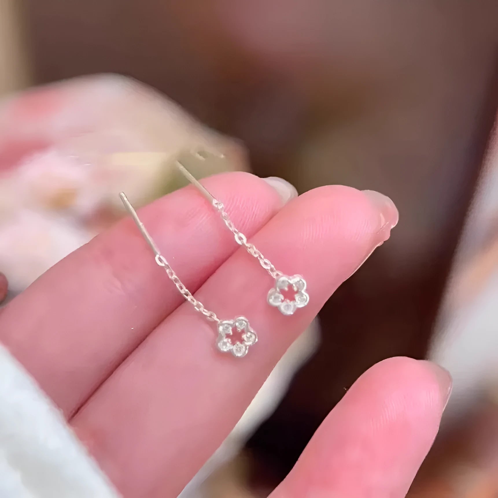 Silver colour hollow floral drop earrings with natural petal design and flower studs
