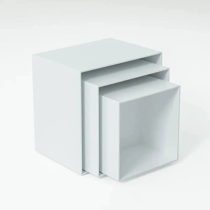 White and transparent plastic dessert display cube sets showing stackable 6-piece arrangements for cakes and pastries