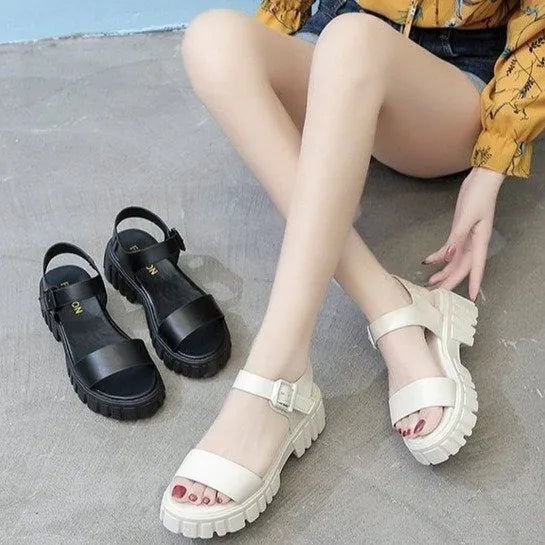 Beige women's platform sandals with peep toe and ankle strap buckle on a white background.