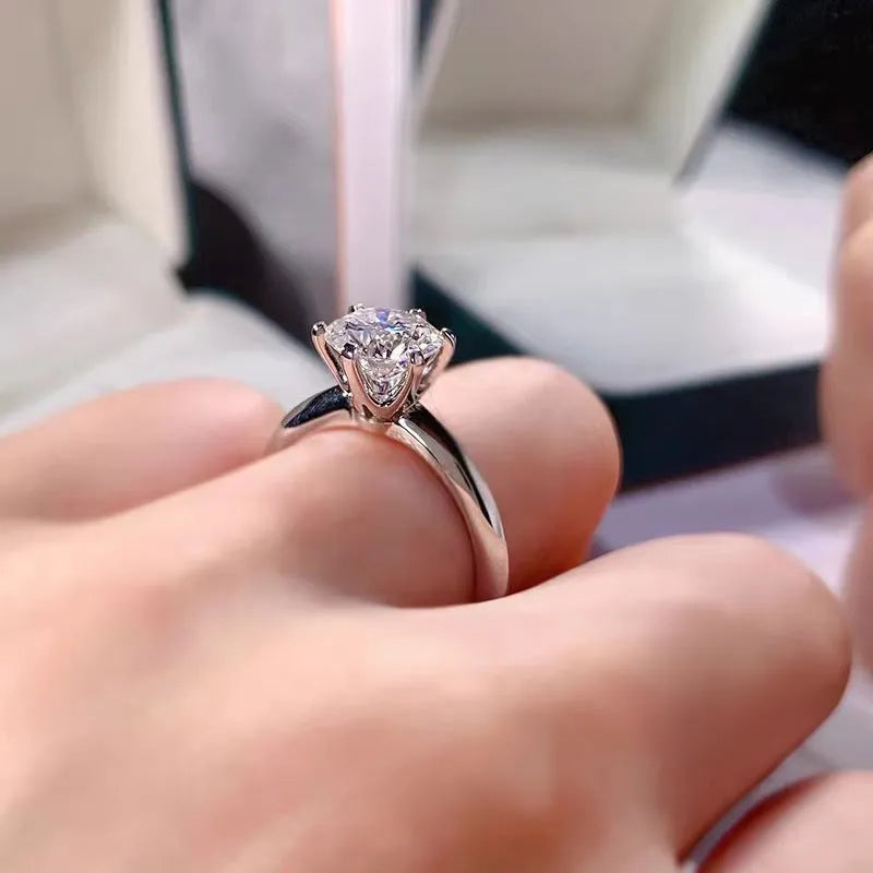 Six-claw inlaid zircon women's ring with geometric design in white gold plated finish