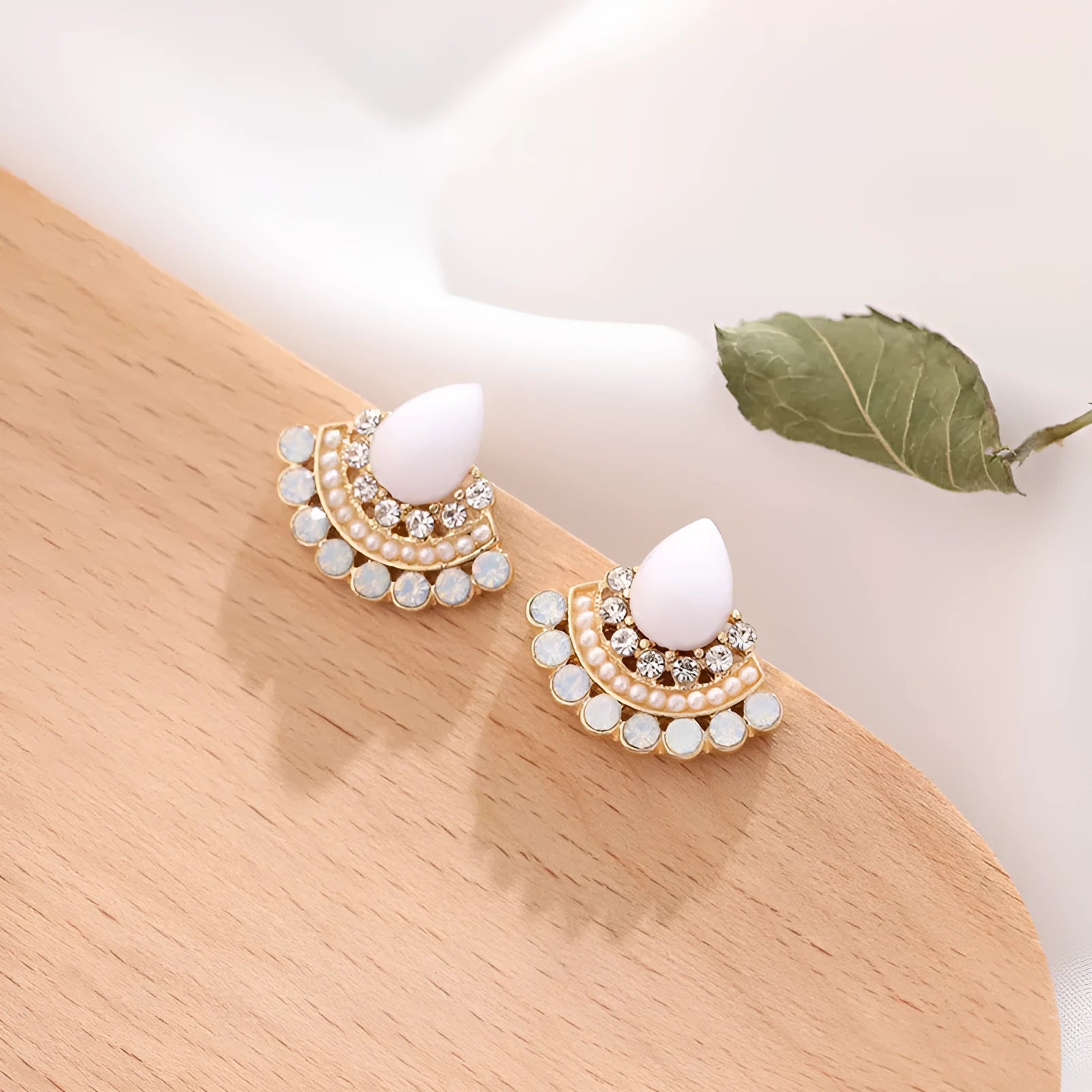 Women's sterling silver fan-shaped geometric earrings with rhinestone and opal decorative detailing