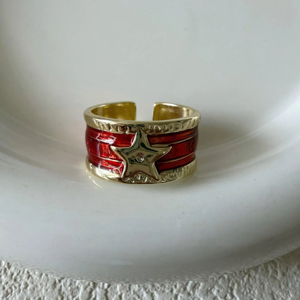 Retro geometric copper ring with adjustable sizing and a distressed finish.