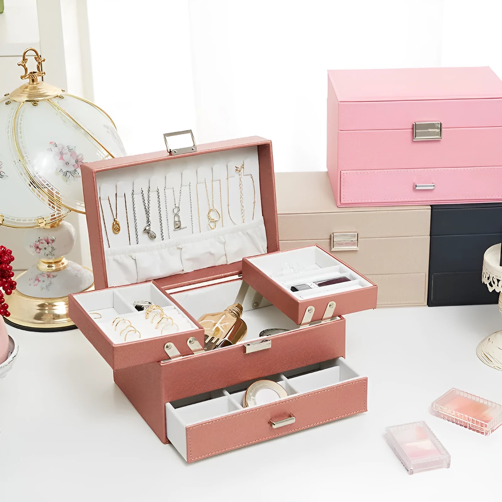 Hard-shell PU leather jewellery storage box in beige, black, pink, and rose gold colour options.