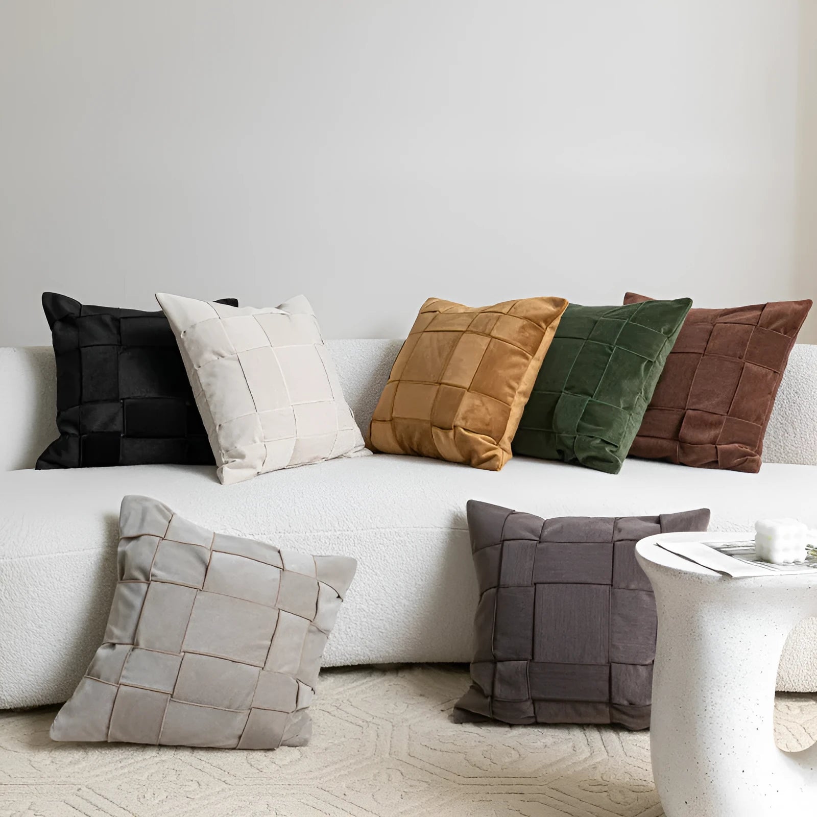 Square chenille woven cushion in beige colour showing textured surface
