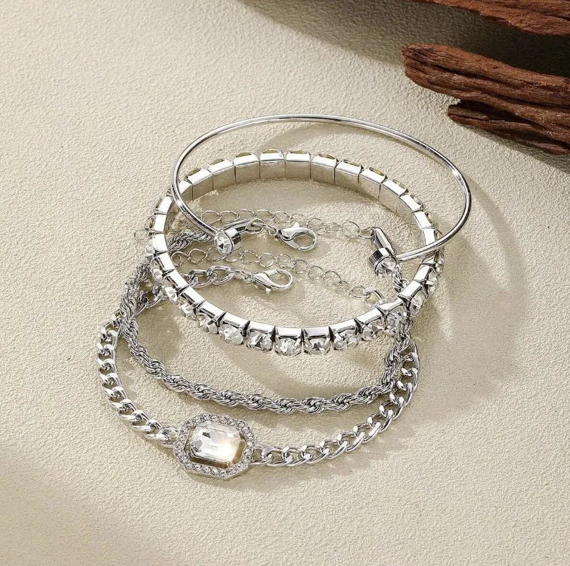 Four-piece retro metal chain bracelet set with square diamond geometric design in gold or silver tone alloy for women.