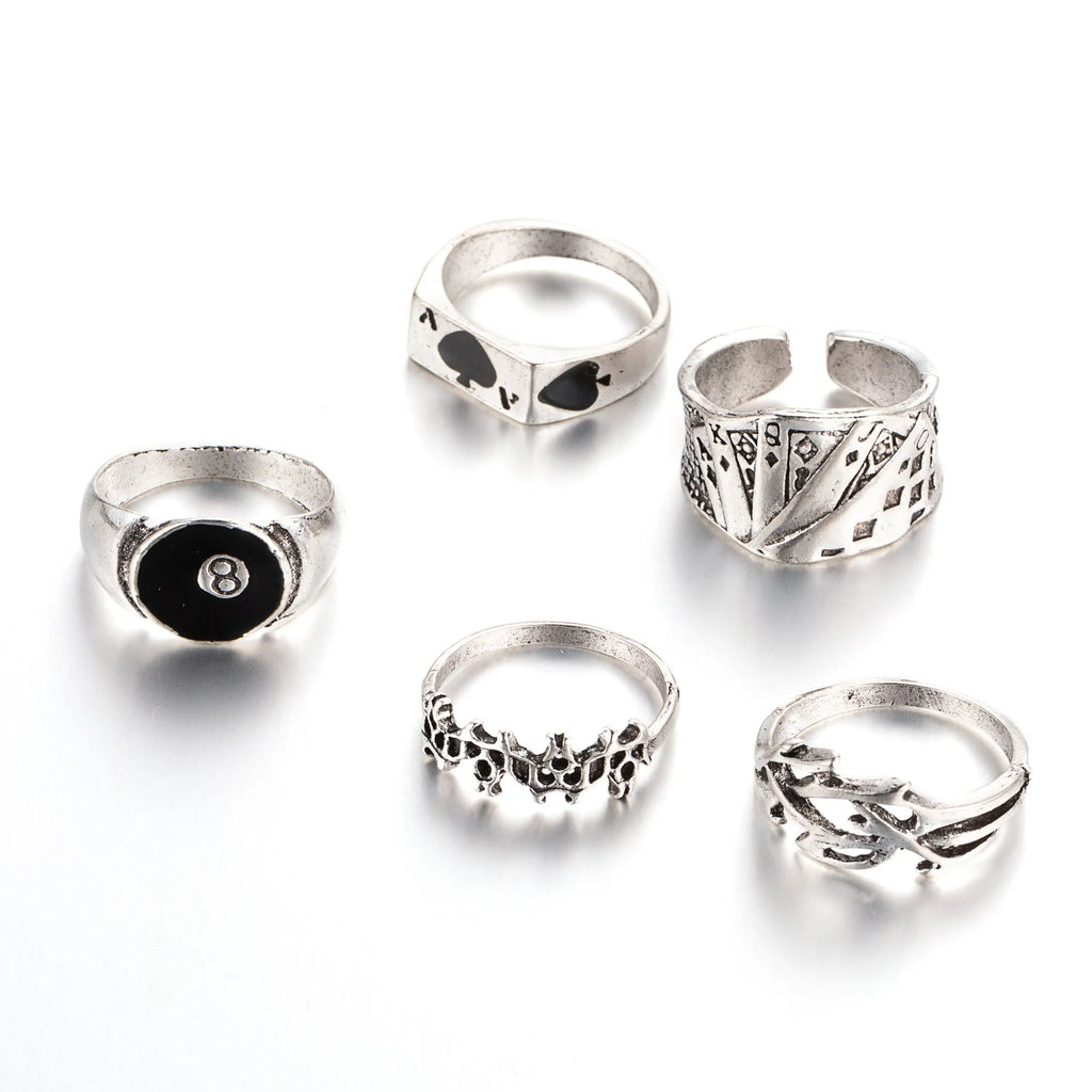 Black alloy ring with a raised retro spade card design on top.