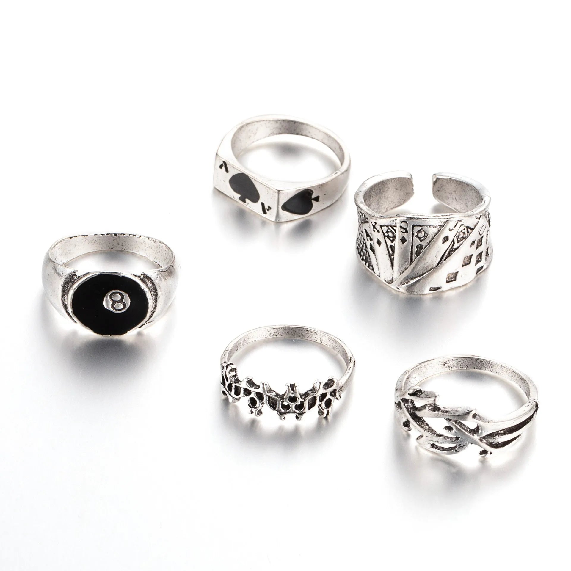 Black alloy ring with a raised retro spade card design on top.