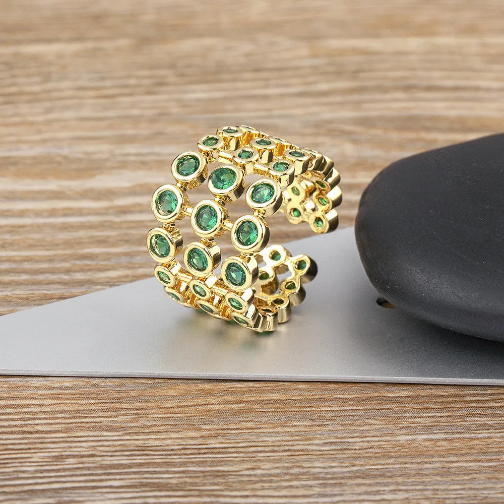 Copper 18K gold plated ring with three-layer green zircon setting in wide band design
