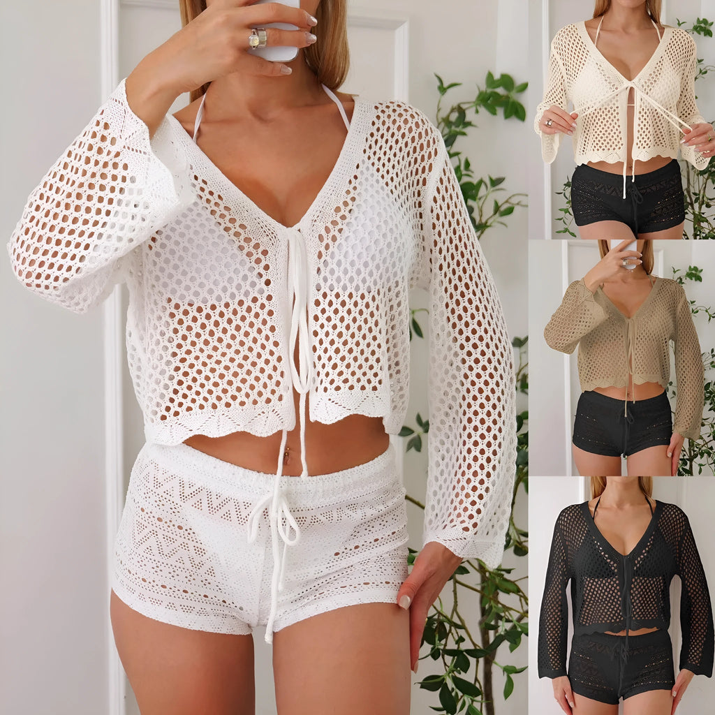 Women's apricot coloured hollow woven blouse with short length and bell sleeves on a hanger.