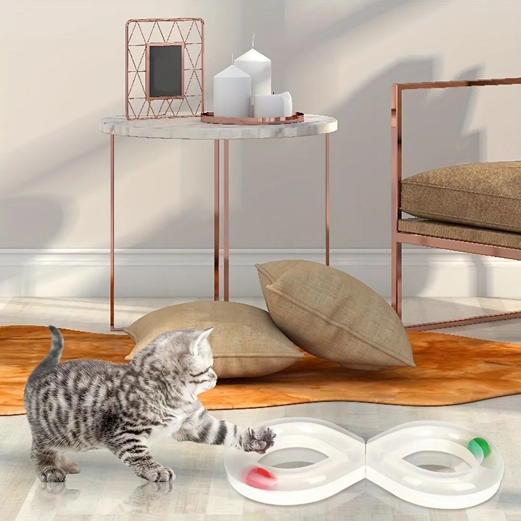 Blue and white cat turntable toy with rotating track ball and teasing stick for feline play