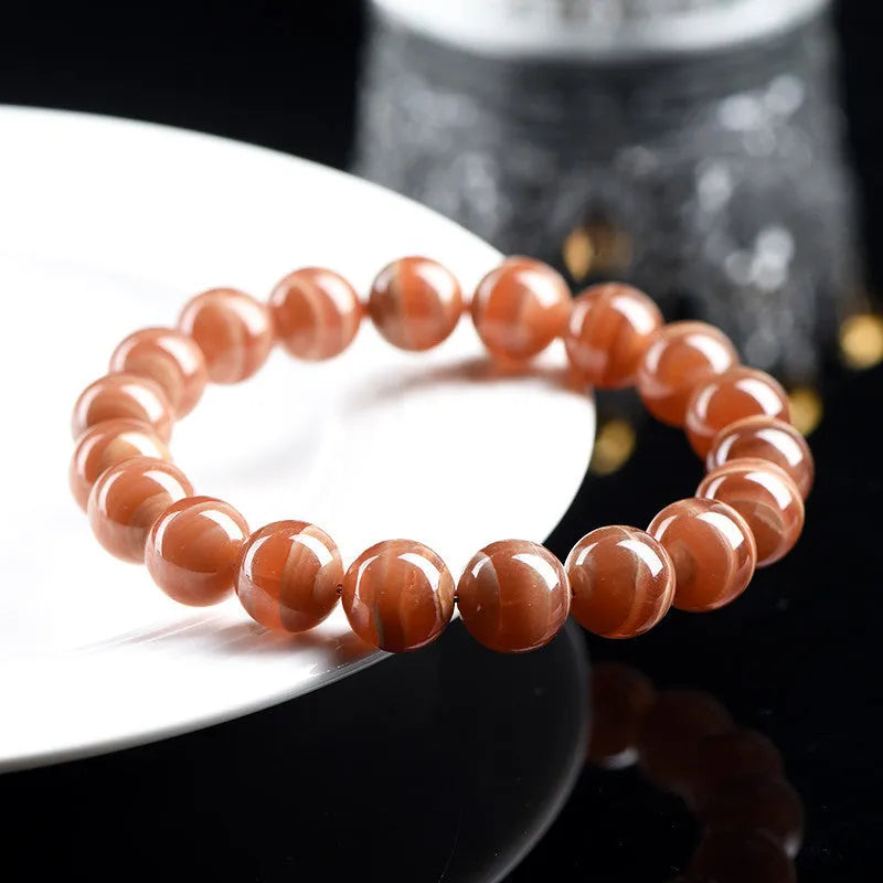 Natural Peruvian rhodochrosite bracelet with round beads in old mine manganese spar colour