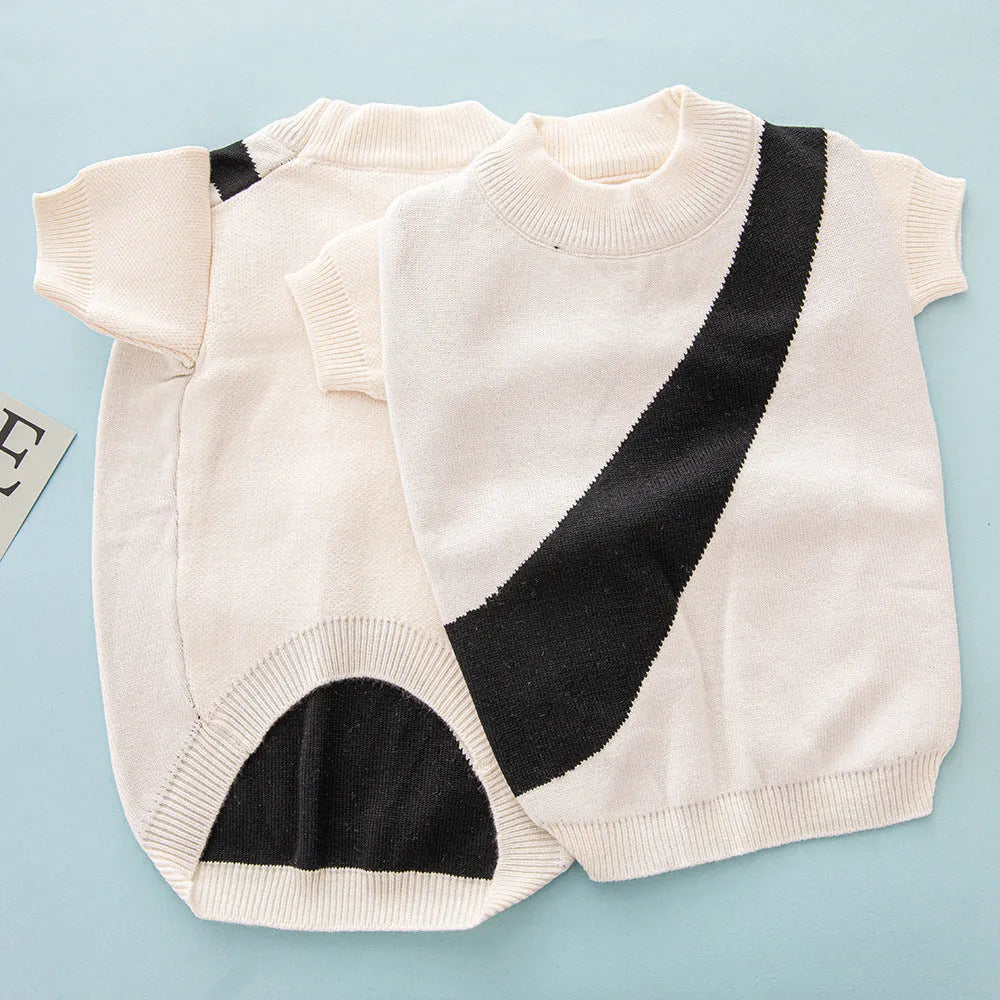 A corgi or poodle wearing a casual-style wool sweater in one of six available colours.