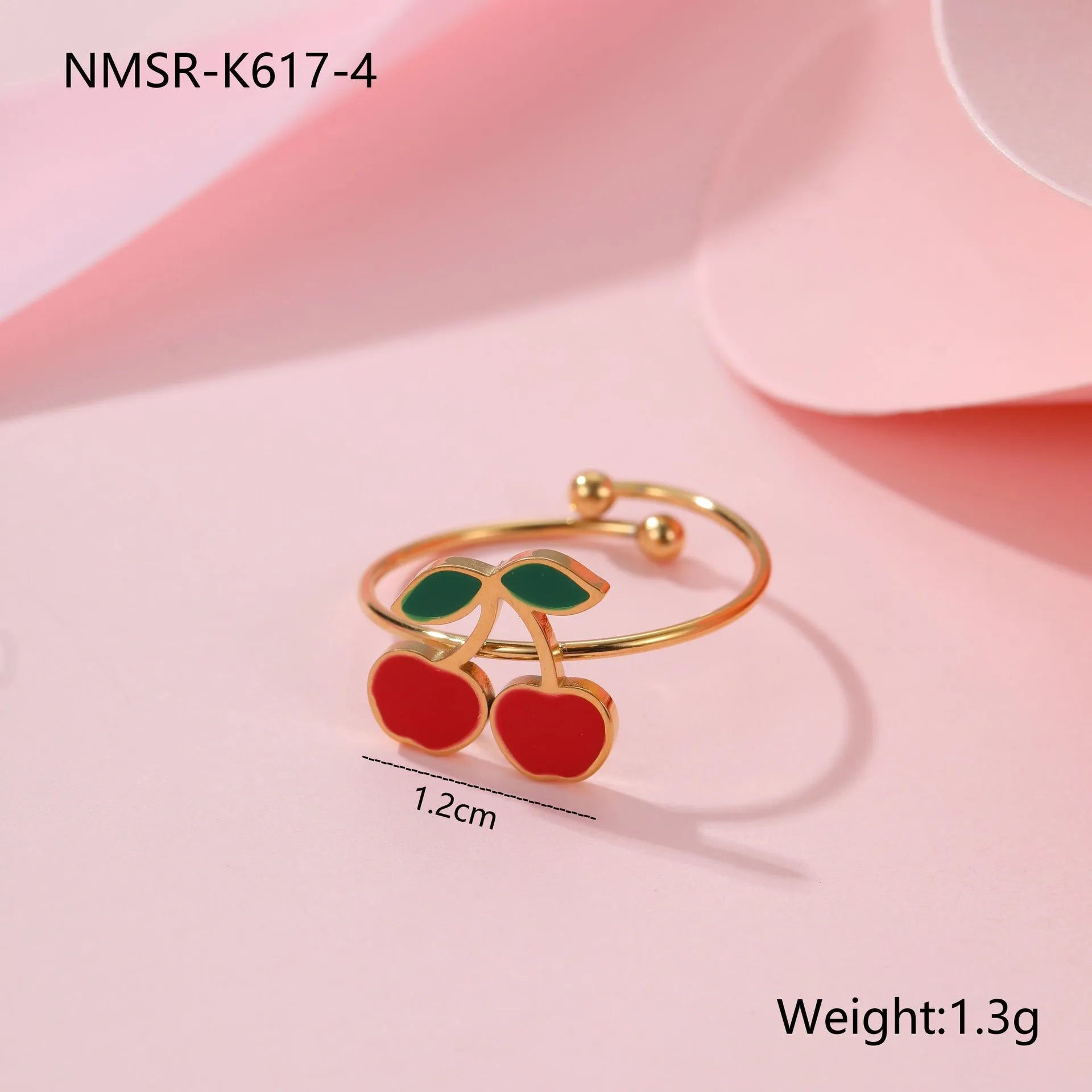 Four-piece cherry jewellery set with necklace, bracelet, earrings and ring in stainless steel with gold-toned finish