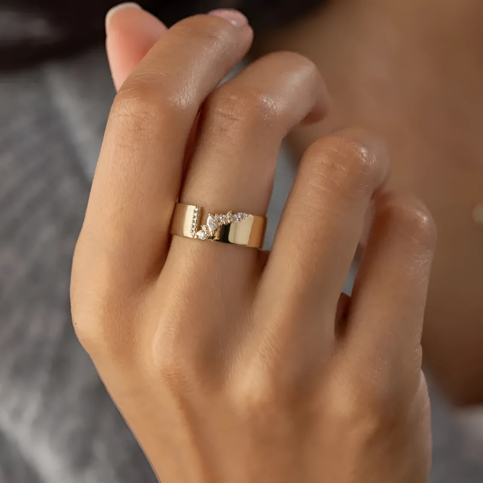 Gold electroplated zircon ring for women showing shining centre stone and metallic finish