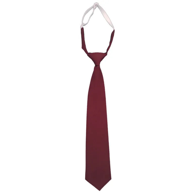 Solid navy blue cotton men's tie with arrow style on a white background.