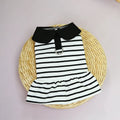 Small dog wearing striped cotton T-shirt and matching skirt summer pet outfit