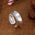 Geometric adjustable open ring with frosted silver electroplated finish