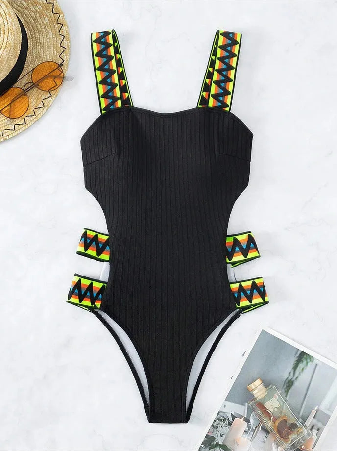 Women's solid colour one-piece swimsuit in black or orange options with Asian sizing