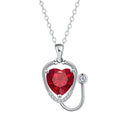 Red diamond copper necklace with stethoscope-shaped pendant featuring wings and cross detailing