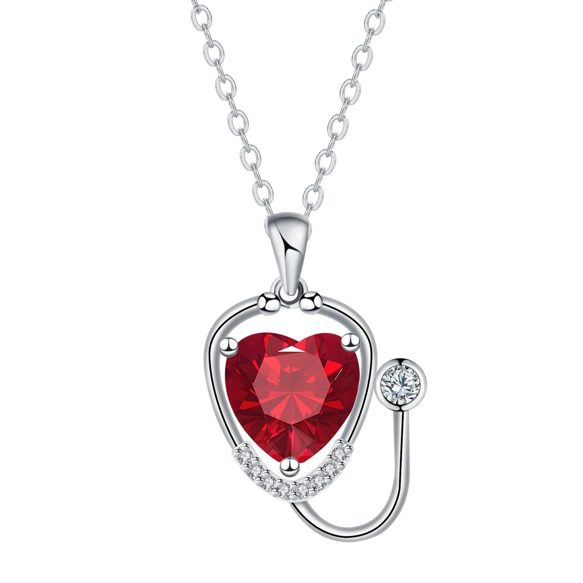 Red diamond copper necklace with stethoscope-shaped pendant featuring wings and cross detailing