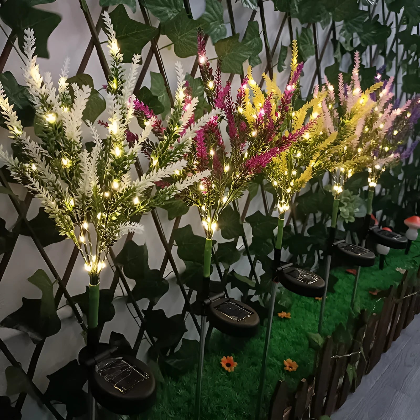 74cm tall solar-powered LED garden light with flower shape and stainless steel stem in a lavender colour