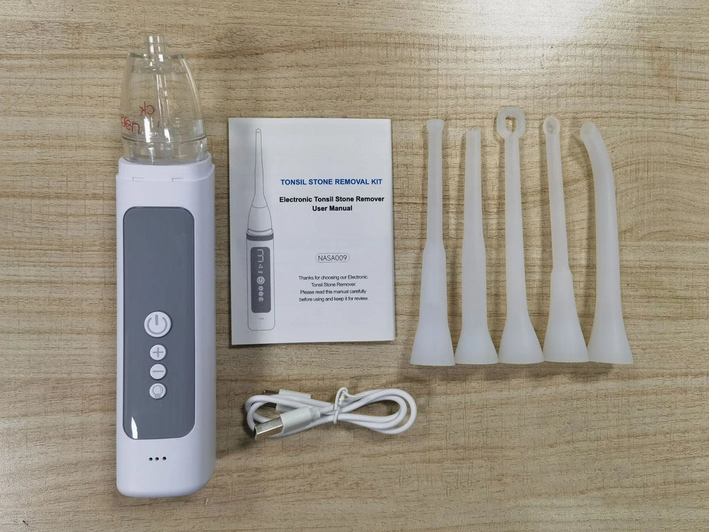 Milky white tonsil stone remover oral cleaning tool with built-in light on a white background.