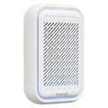 White wall-mounted plug-in air purifier unit for small rooms