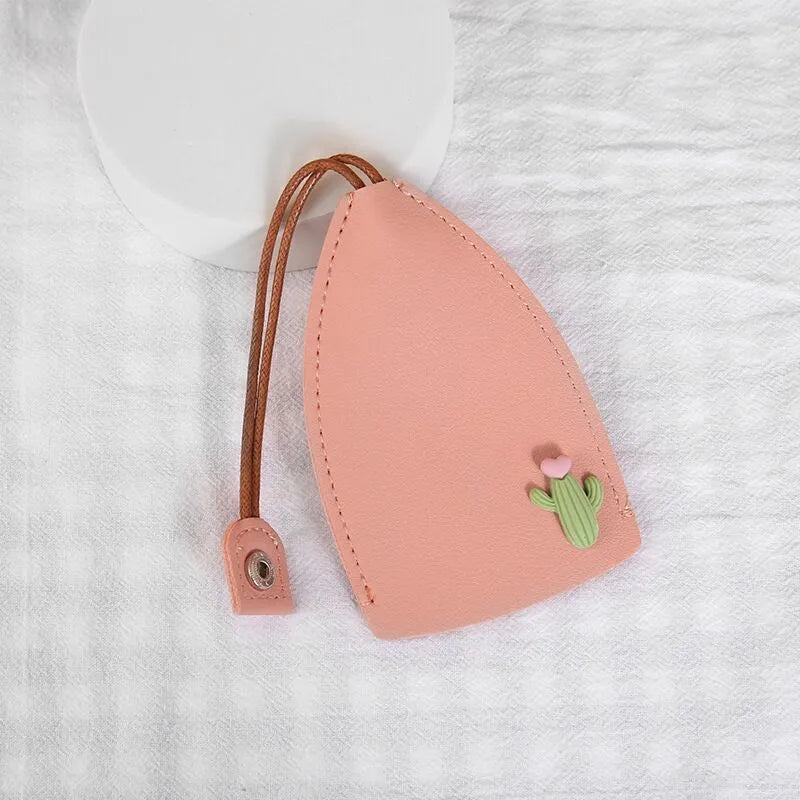 Cartoon-themed PU leather car key case with pull-out mechanism measuring 14x7.5 cm