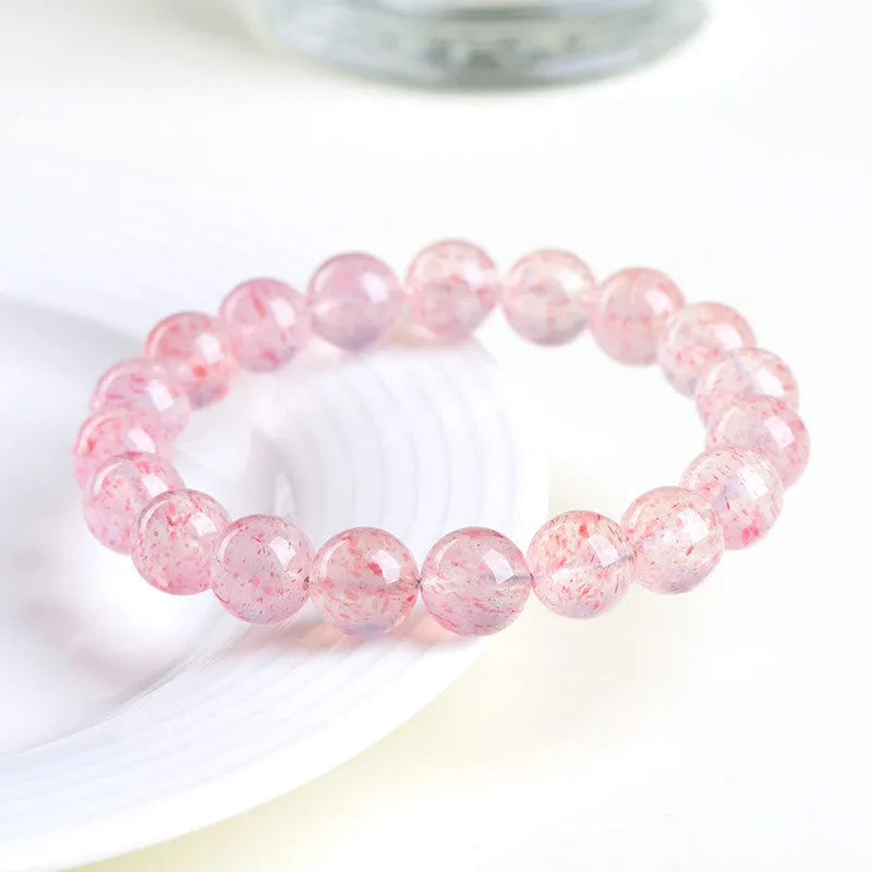 Natural white water strawberry quartz crystal bracelet with 10-10.8mm geometric beads.