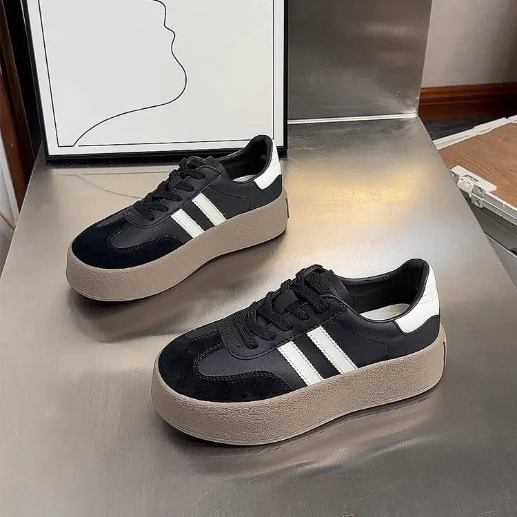 Women's vintage distressed leather sneakers with round toe and front lace-up design