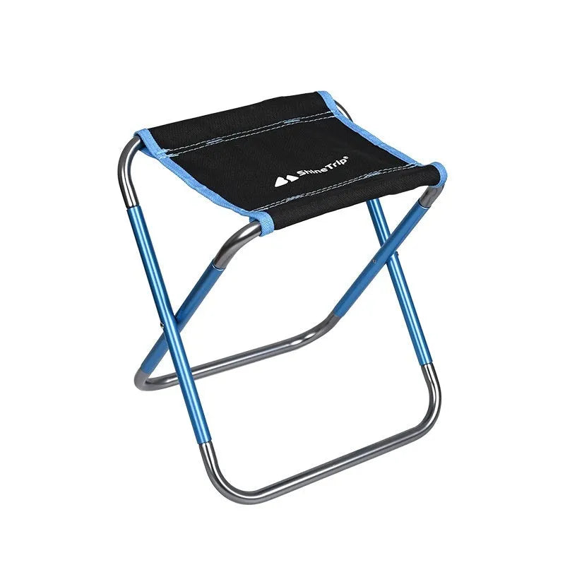 Black ethnic style aluminium alloy folding camp stool shown folded and unfolded.