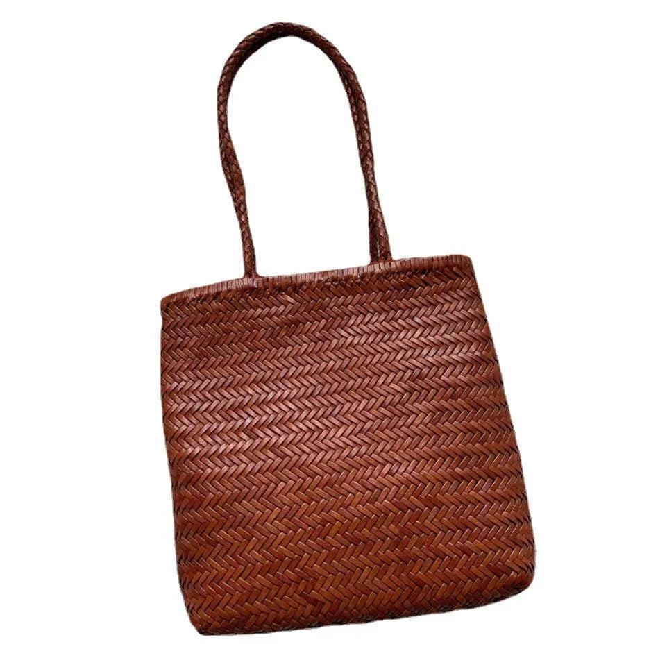 Brown woven leather tote bag with three-dimensional pocket and polyester lining