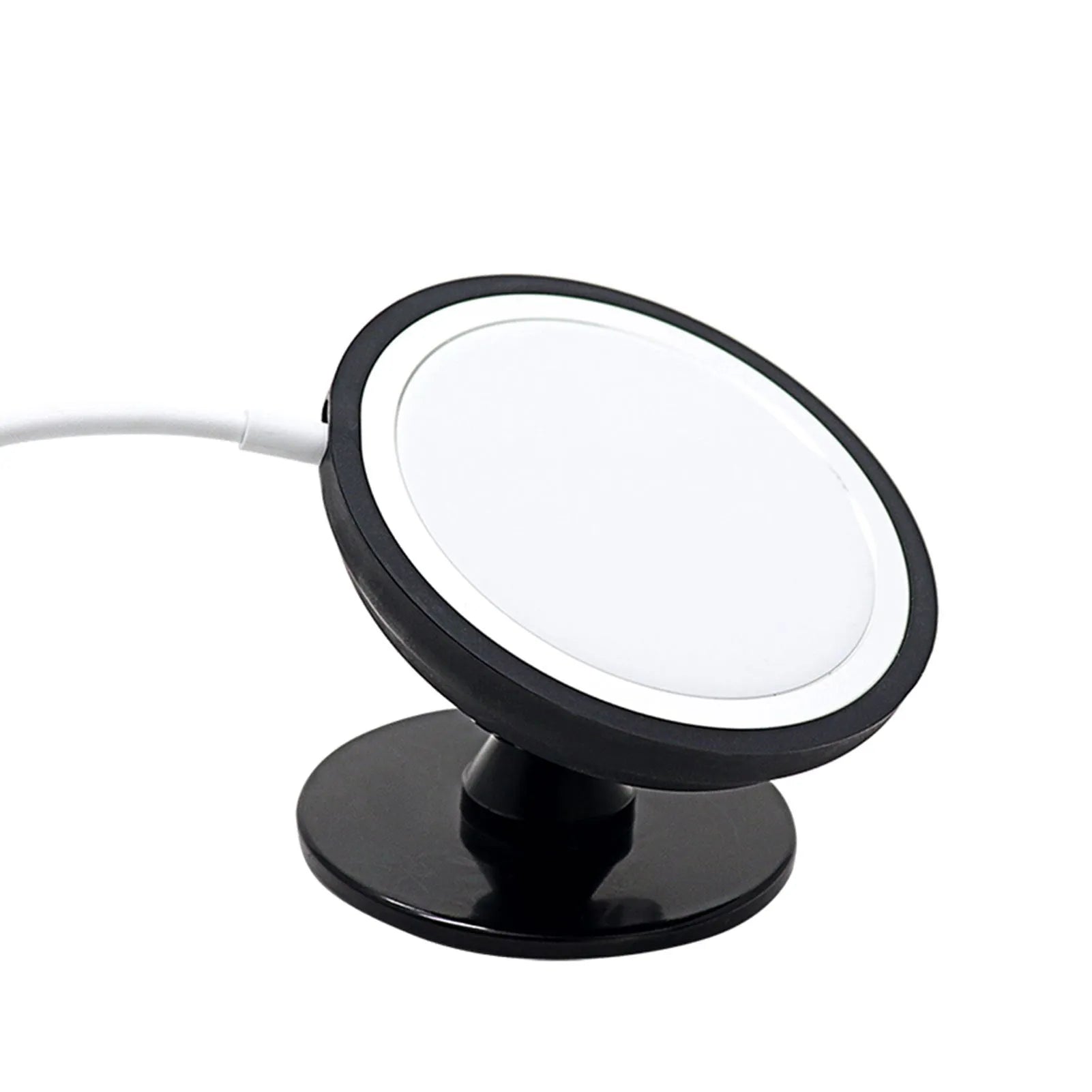Black car magnetic phone holder mounted on car air vent with phone attached