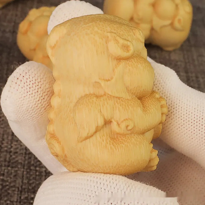 Solid bamboo carving ornament with Take Money design measuring 4.5cm high and 3.5cm diameter