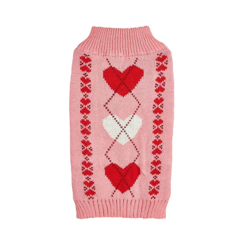 Red love heart design on a pink acrylic dog sweater for a small dog.
