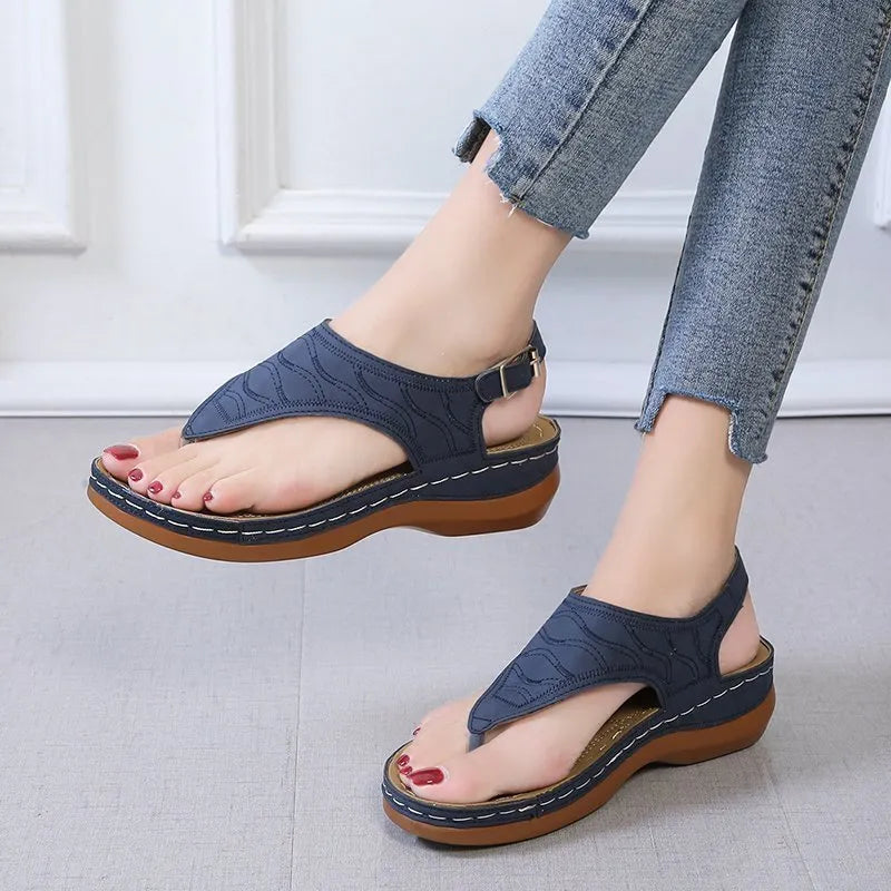 Women's casual wedge heel sandals with adjustable back strap in vegan leather