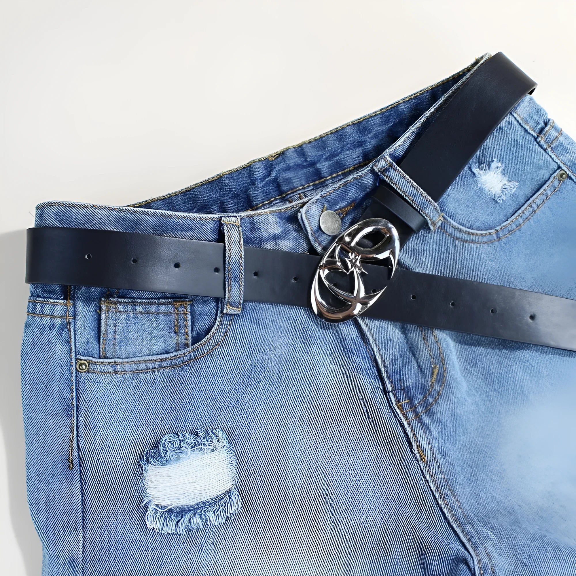 Men's silver buckle casual belt made from black PU leather with snap button closure.