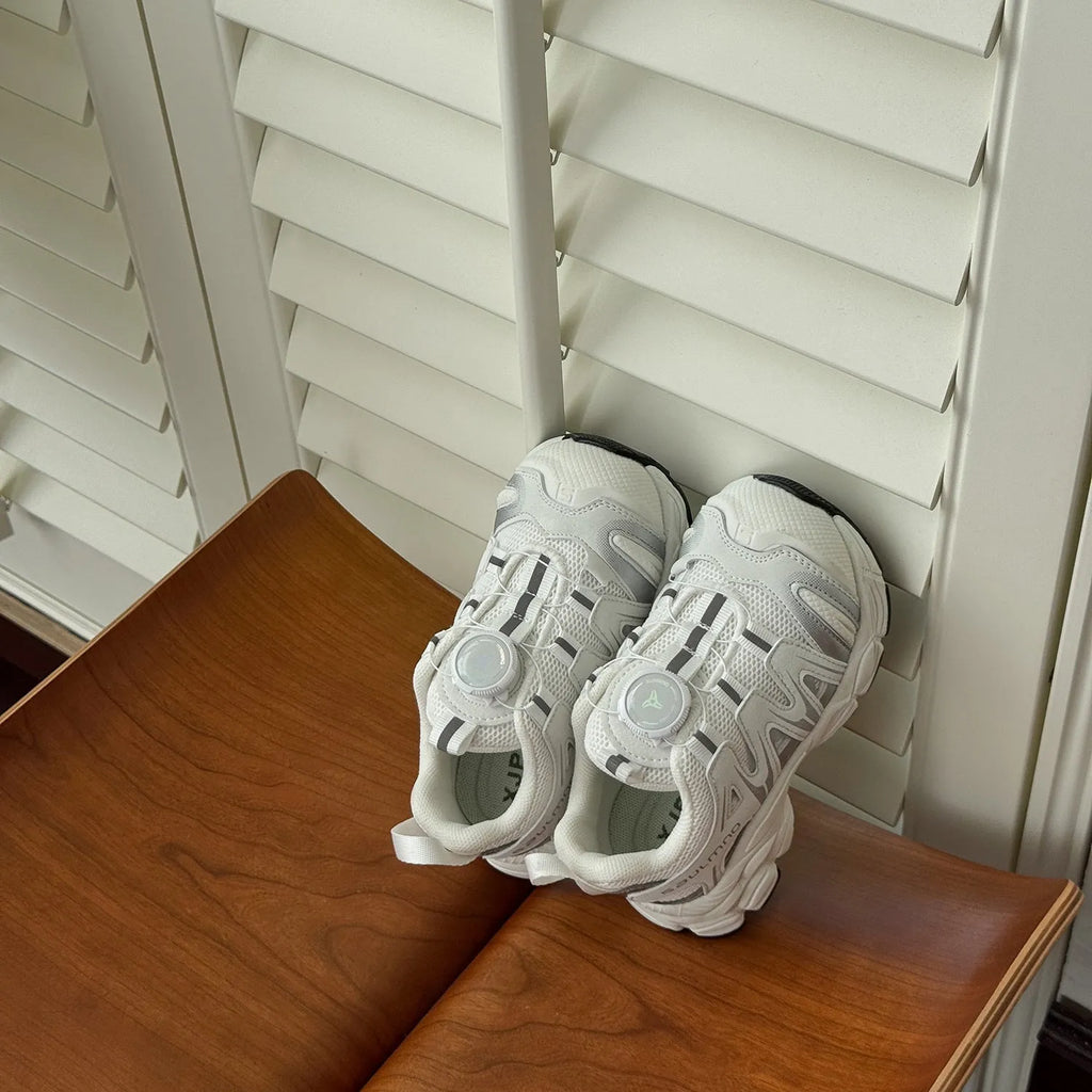 Girls lightweight casual shoes with PU leather mesh upper in black, beige, or pink colours.