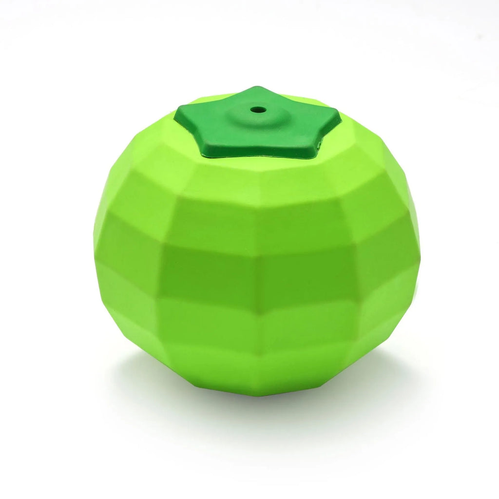 Green natural rubber dog chew ball with squeaker for large breed aggressive chewers.