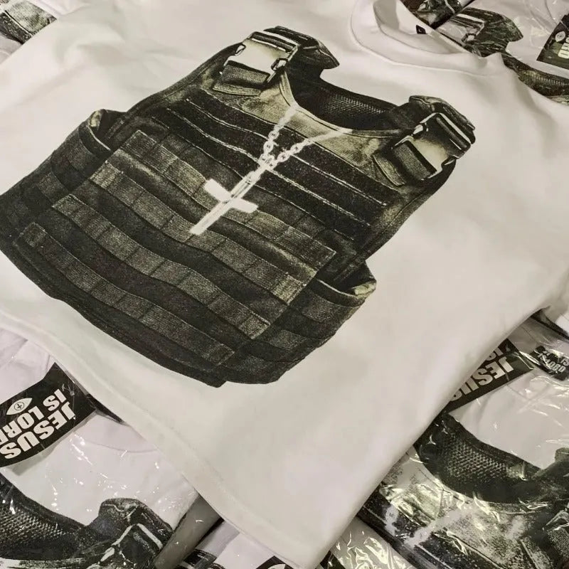 Man wearing a printed cotton short sleeve retro-style T-shirt with drop-shoulder sleeves.
