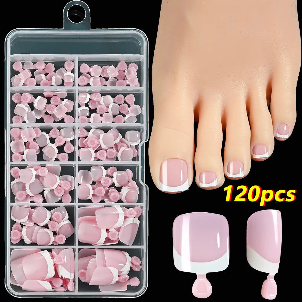 Open box showing 120 French style toe nail pieces with white tips in various nude colours.