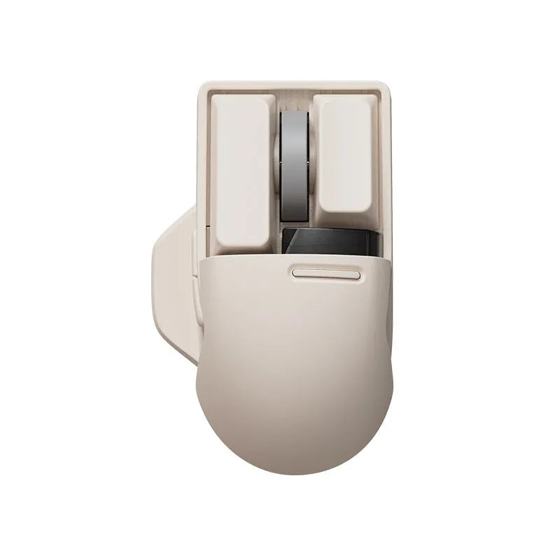 Xiaoqiao tofu-colour wireless mouse showing seven buttons and scroll wheel on desktop