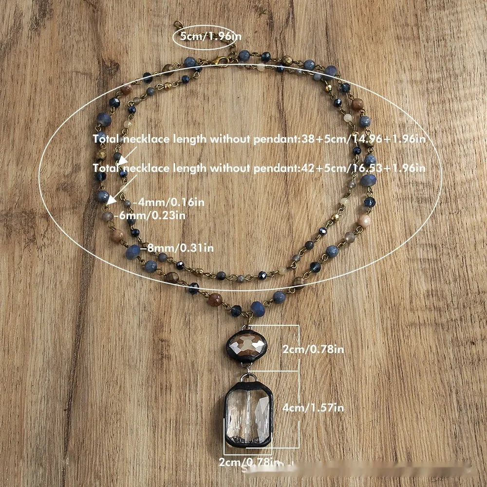 Tribal style two-layer chain necklace with glass and stone pendants in beige and blue colours