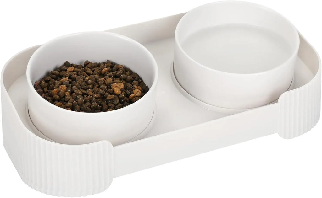 Green ceramic elevated cat bowl set with 15-degree tilt and non-slip base