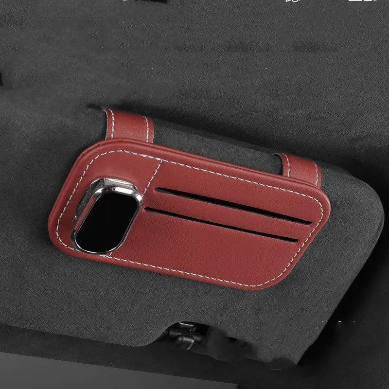 Cowhide leather car sun visor holder with card slots and integrated sunglasses clip.