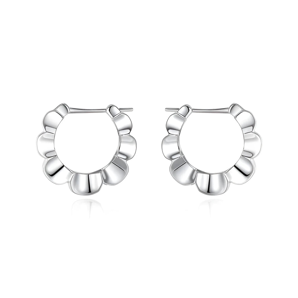 Sterling silver geometric earrings with circular elements and retro design