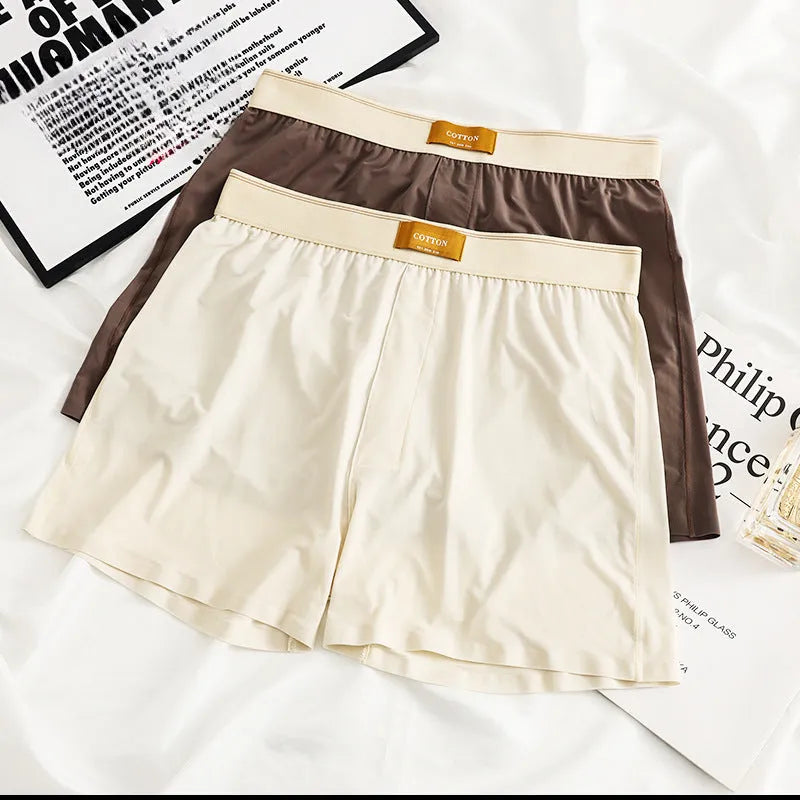 Men's loose fit ice silk underwear in solid colours on mannequin showing mid waist style