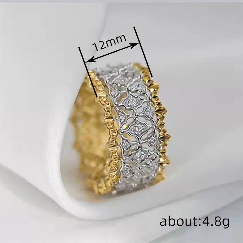 Gold and silver two-tone geometric zircon ring made from copper, showing a round design detail.