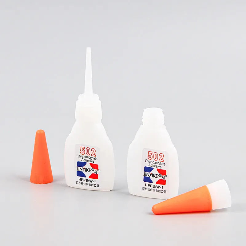 Tube of specialised instant strong adhesive for shoe and leather repairs